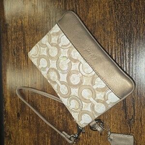 Coach shimmer bronze wristlet bag